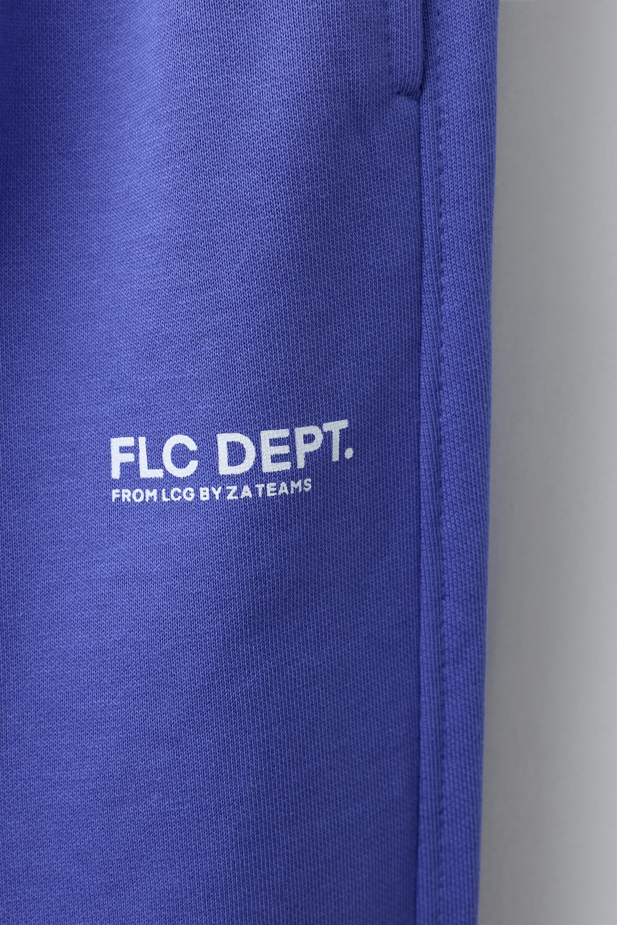 PANTALON JOGGER EN MOLLETON AVEC TEXTE